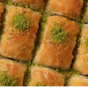 Close-up of baklava squares topped with crushed pistachio