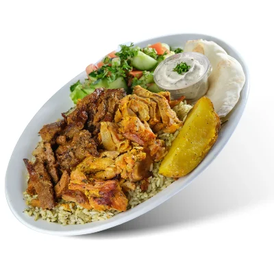 Mixed chicken, beef and lamb shawarma plate with dill rice, salad, tzatziki and pita
