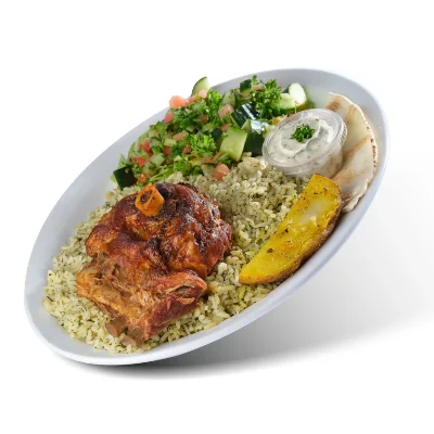 Roast lamb on dill rice with salad, a potato wedge, tzatziki and pita
