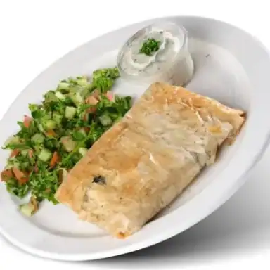 Flaky spinach pie with herb salad and a cup of tzatziki