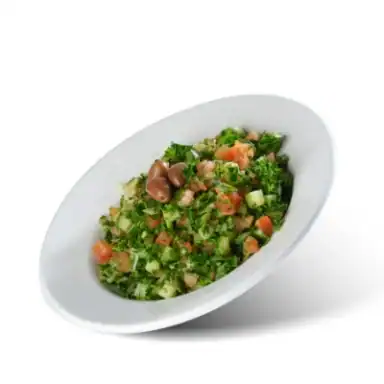 Tabouleh salad of parsley, bulgur and tomato
